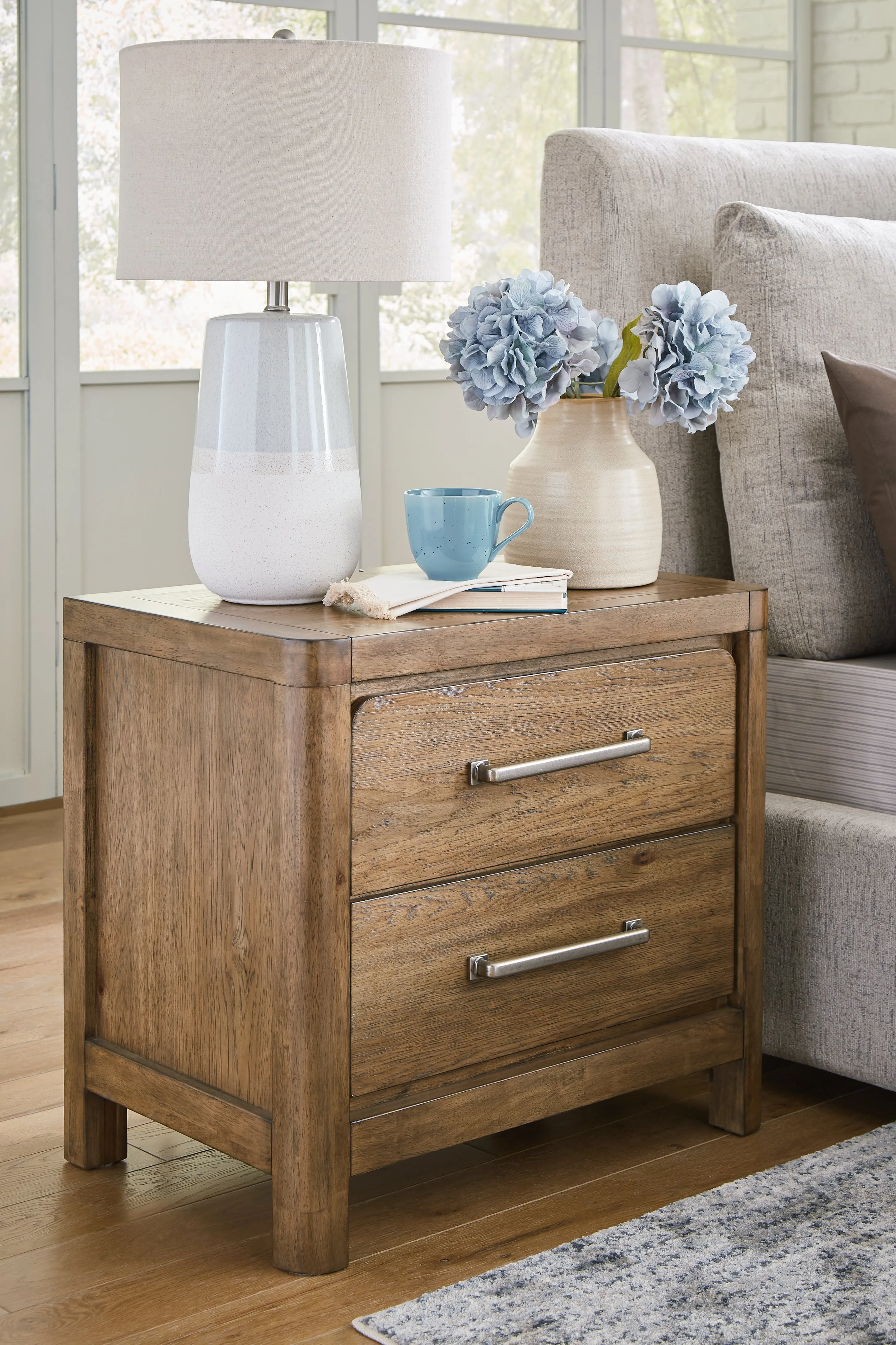 Cabalynn King Panel Bed with Storage with Mirrored Dresser and 2 Nightstands in Light Brown